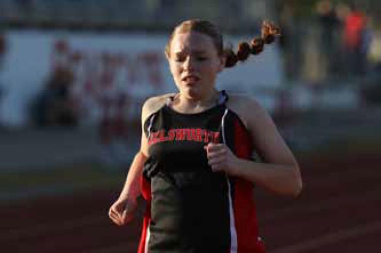 Leah Warta competes at the home track meet April 15.