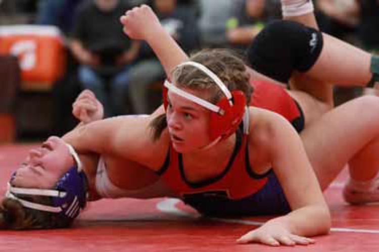 Sophie Homolka competes in the 145-lb. weight class in December at Minneapolis. She placed second at regionals and heads to state wrestling Feb. 27-28 in Hays. KAREN BONAR/Ellsworth County Independent-Reporter