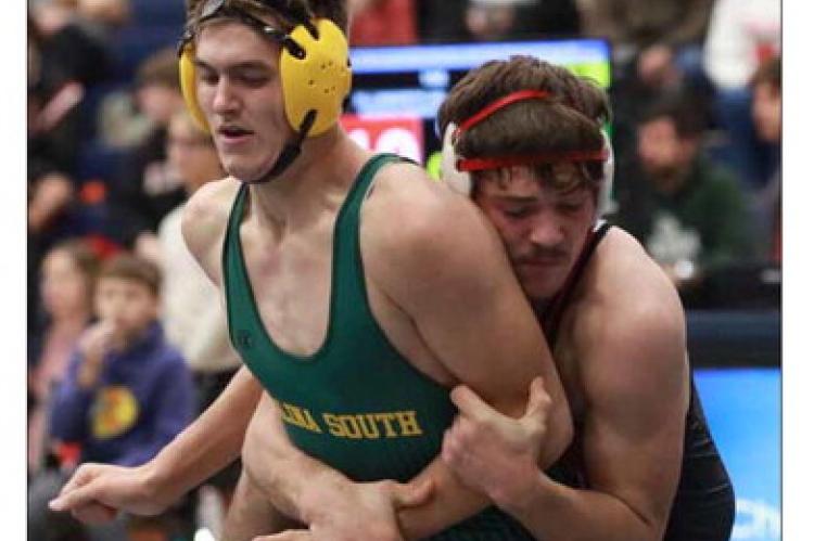 Ellsworth’s Keegan Urbanek, right, competes against a wrestler in December at Minneapolis. Urbanek, along with the girls’ and boys’ wrestling teams, will compete at state this weekend in Hays. KAREN BONAR/Ellsworth County Independent-Reporter