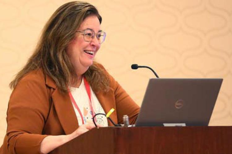 Lynn Kasper, director of Feeding the Children of Central Kansas, presents this spring in Dallas. Courtesy photo