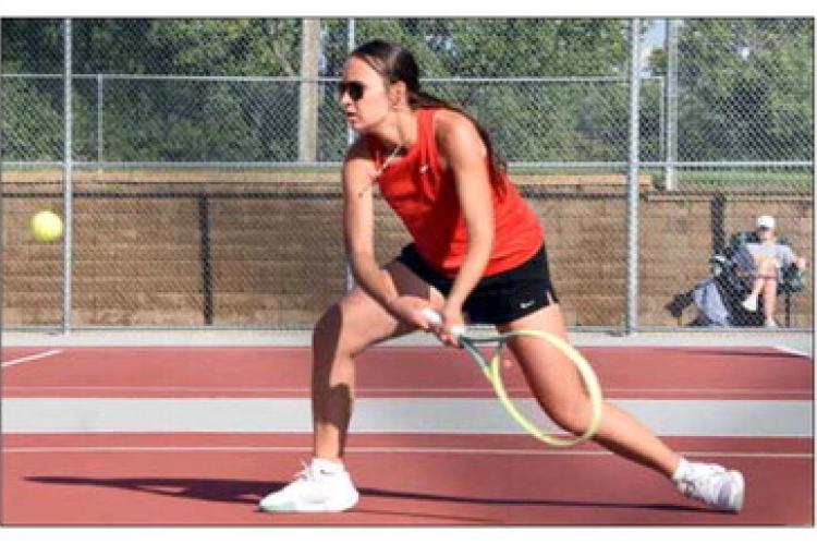 Karli Haase competes in No. 1 singles at home Sept. 18. She placed second at the home tournament. Photos by CATHERINE DOUD/Ellsworth County Independent-Reporter