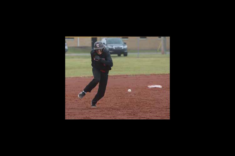 Johnny Barta is struck by a line drive as he heads to third base.