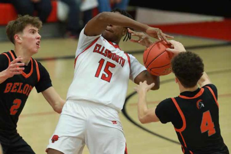 Ellsworth’s Cooper McGowan attempts to maintain control of the ball against Beloit opponents Kale Leners (2) and Charlie Burke (4) during the Dec. 19 home game. KAREN BONAR/Ellsworth County Independent-Reporter