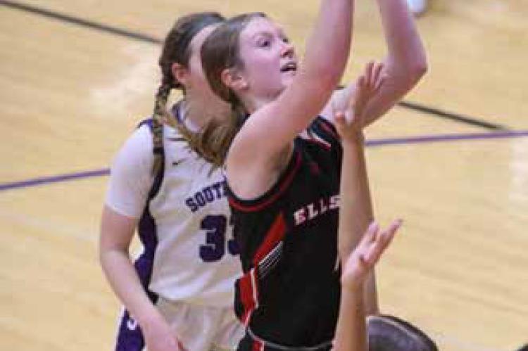 Ellsworth’s Alexis Moore goes up for 2 over a SES opponent during the Jan. 31 game in Gypsum. KAREN BONAR/Ellsworth County Independent-Reporter