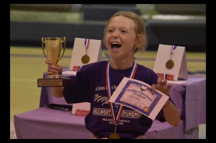 Ripley Kepka celebrates as she’s recognized as the 2026 Reading Grand Champion and winner of the Claudia Patry Reading Award. In addition to the medal, certificate and trophy, her name is engraved on the plaque honoring each year’s winner. CATHERINE DOUD/Ellsworth County Independent-Reporter