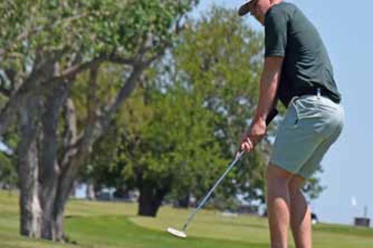 Junior Cameron Gardner competes in the league tournament in Minneapolis May 13.