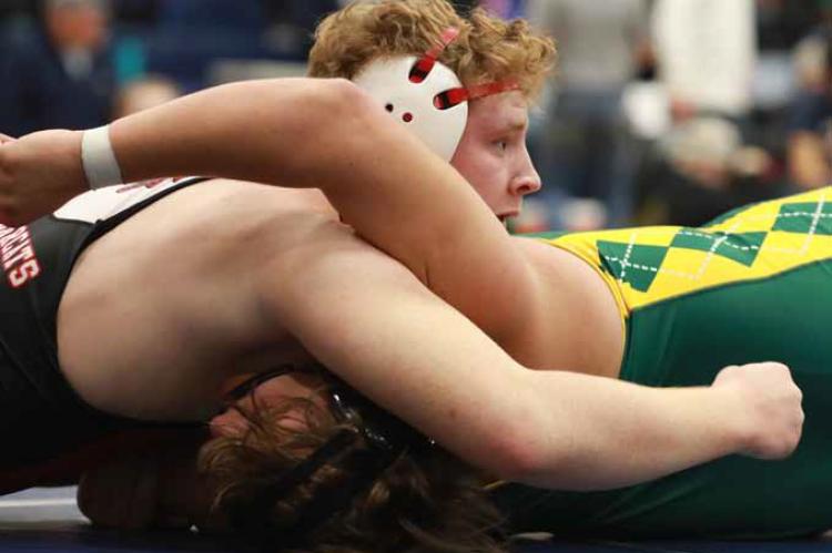 Ellsworth’s Micah Galvan works to pin Salina South’s Ryan Jackson during the Jeff Giles Invitational in Minneapolis Dec. 13. KAREN BONAR/Ellsworth County Independent-Reporter