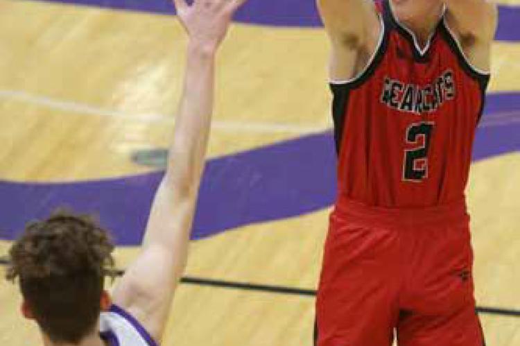 Ellsworth’s Jace Thomasson attempts a 3-pointer over Southeast of Saline opponent Cooper Carlin during the Jan. 31 game in Gypsum. KAREN BONAR/Ellsworth County Independent-Reporter