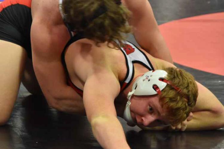 Junior Micah Galvan competes in the 175-pound weight class Jan. 11 at Ellsworth Jr./Sr. High School. Galvan placed second in his weight class. CATHERINE DOUD/Ellsworth County Independent-Reporter