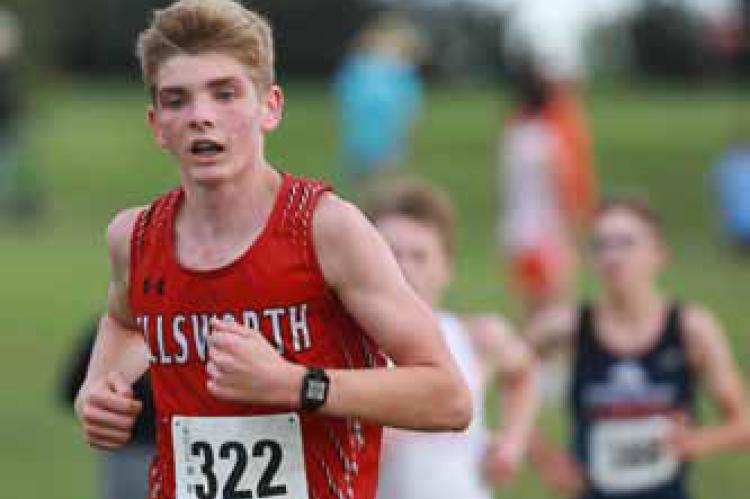 Senior Hunter Kinsley runs the final stretch of the Ellsworth Invitational Cross Country Meet Oct. 7. He placed 12th overall.