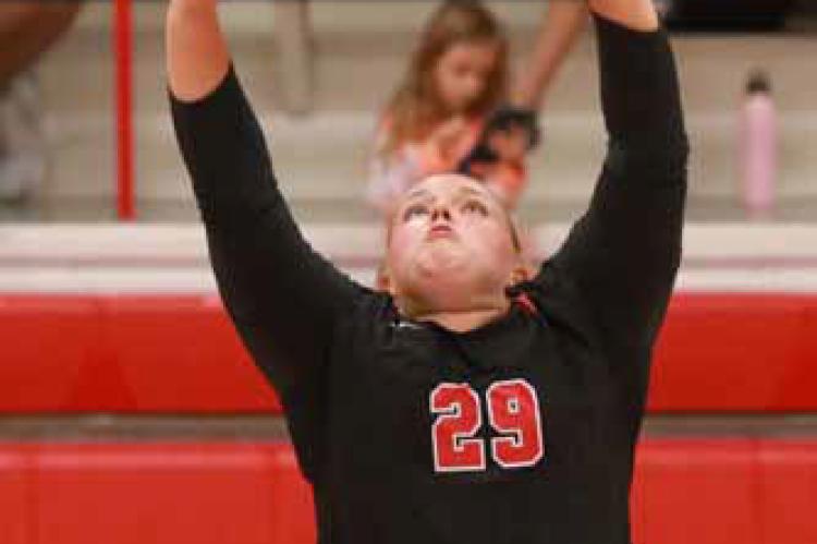 Ellsworth’s Jodi Donley sets up a shot during the second game of the first match Sept. 2 at home.