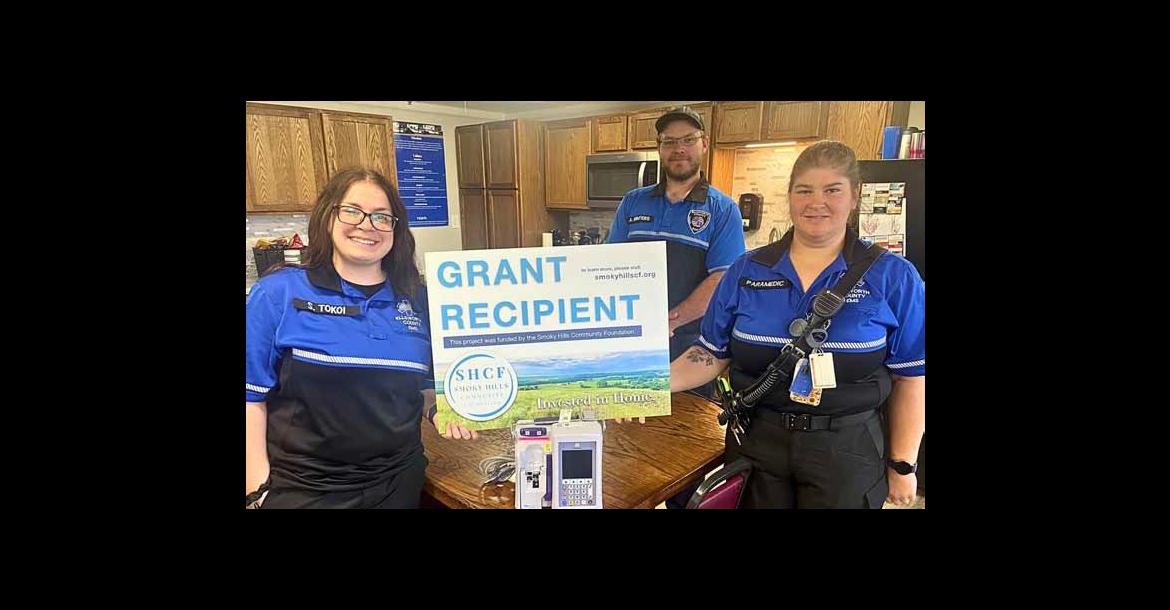From left, EMT Scout Tokoi, paramedic Alex Winters and paramedic Elisabeth Mohler show the new IV pump purchased with grant funds. Courtesy photo