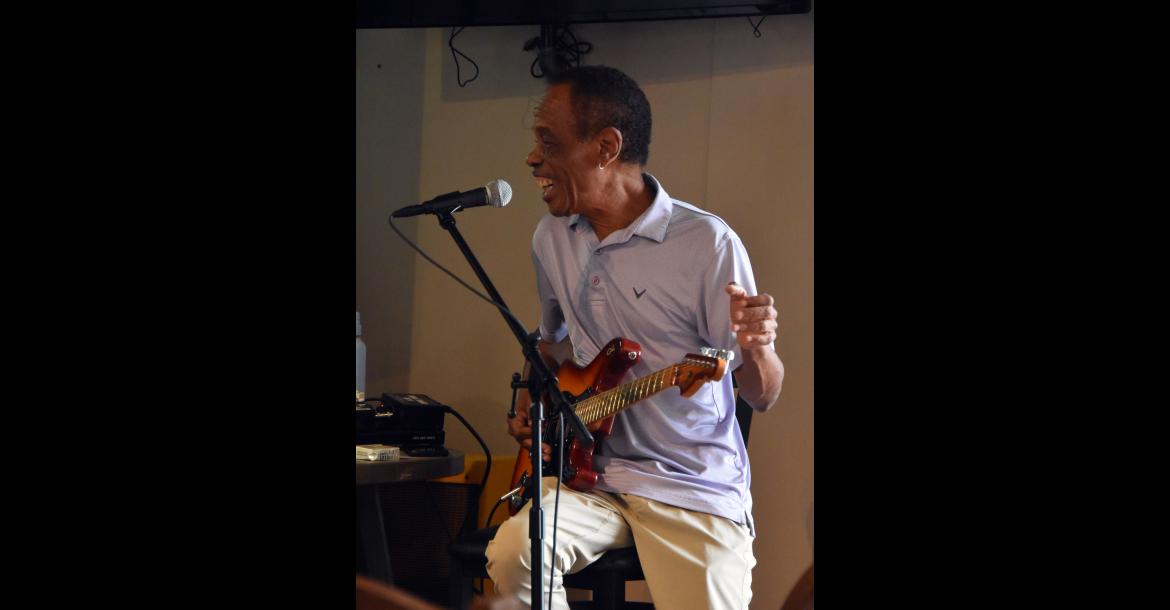 Acclaimed blues artist James Armstrong talks to the crowd while presenting a master class Saturday afternoon at the Roots & Blues Festival in T he Barn at the Midland Railroad Hotel.
