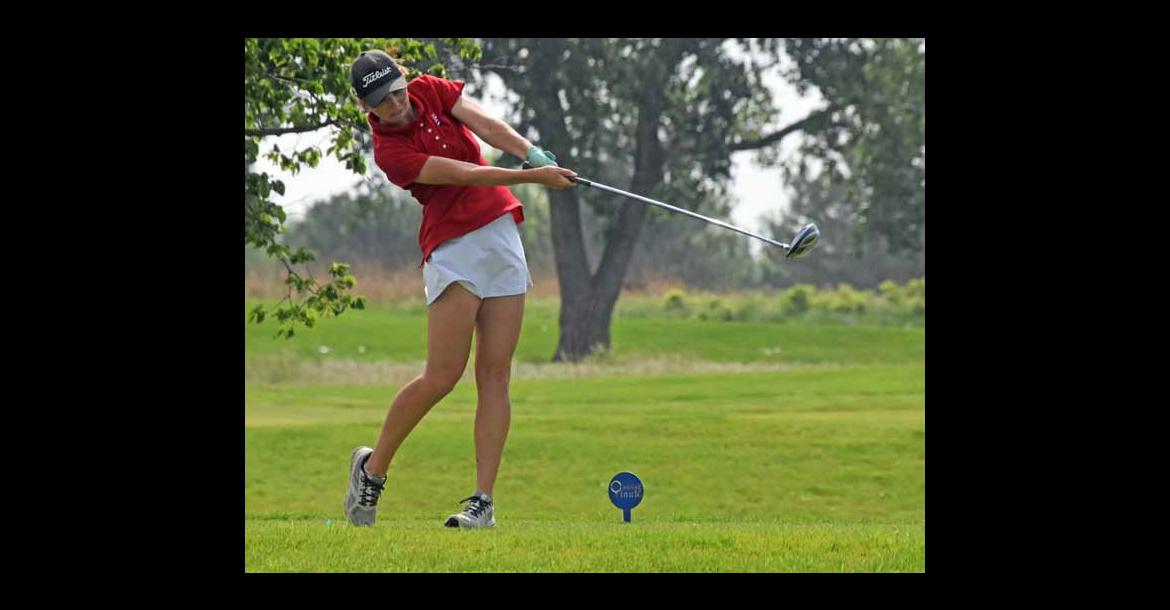 Elyse Haxton tees off at the Salina Municipal Golf Course during regional competition Monday. She shot 112 and placed 62nd. CATHERINE DOUD/Ellsworth County Independent-Reporter