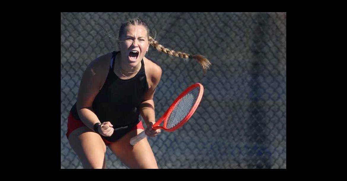Makenna Anderson celebrates during the state tennis tournament in Topeka. Anderson and her doubles partner, Reygan Coonrod, placed second. Courtesy photo