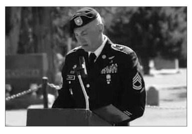 Kansas Army National Guard SFC Gabriel Bailey gives the Memorial Day address at Wilson City Cemetery. JAN SHAW/Special to the I-R
