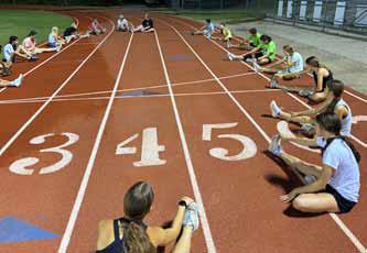 The cross country team stretches during a morning practice Sept. 4. ERIC COONROD/Ellsworth County Independent-Reporter