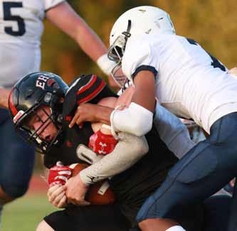 Junior Bo Kyler runs the ball during the first half of the home season opener Sept. 4. KAREN BONAR/Ellsworth County Independent-Reporter