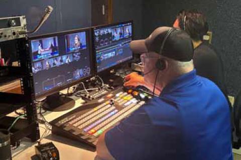 Senior Producer Les Kinderknecht works on a Smoky Hills PBS program. He has been with the station for 36 years. Courtesy photos