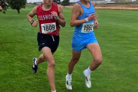 Octavio Rodriguez, left, placed 11th at the cross country regional meet Oct. 25.